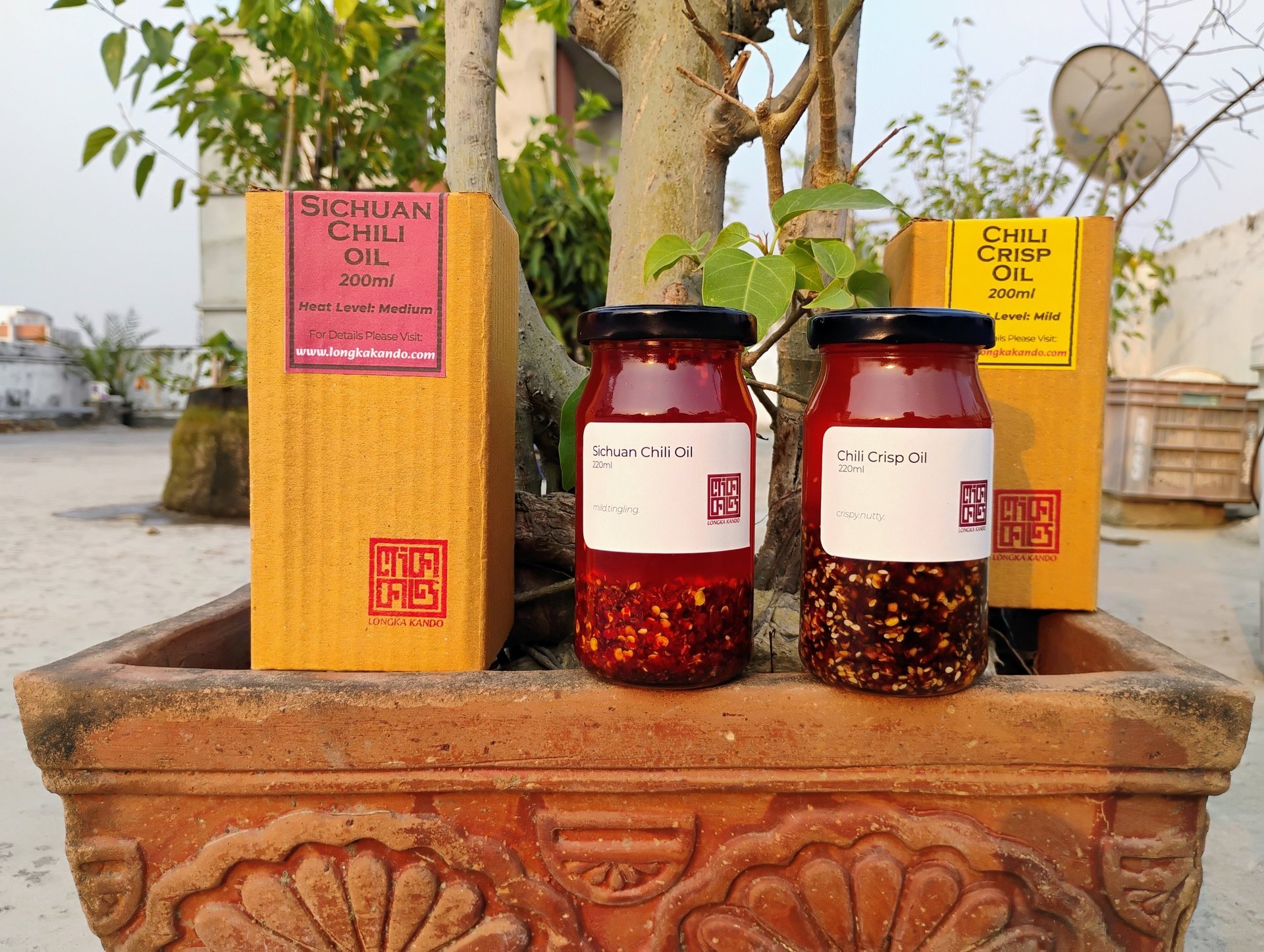 two jars of chili Oils and Two boxs of chili oils from Longka kando