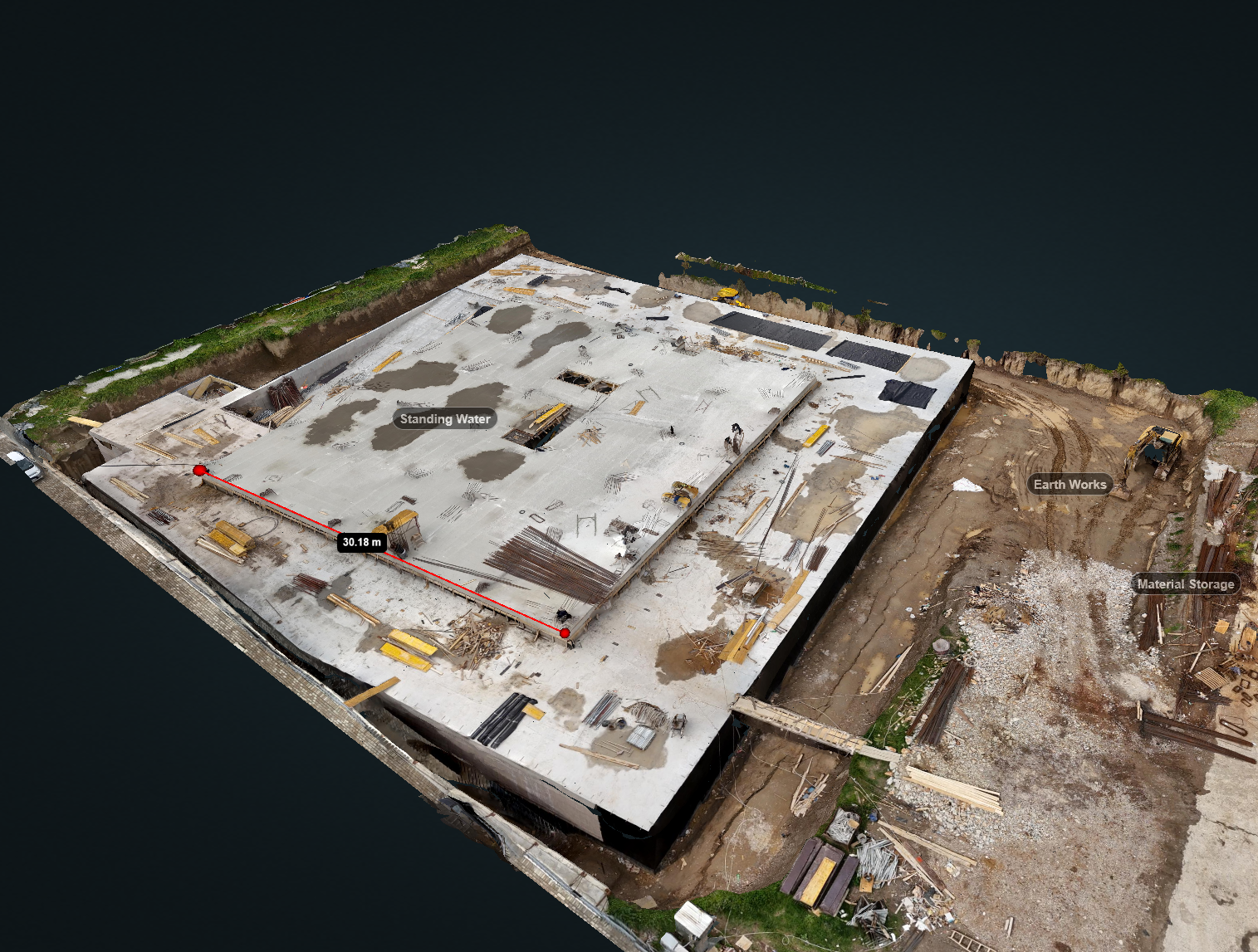 Aerial orthomosaic of an active construction site — concrete slab pour stage with progress monitorin
