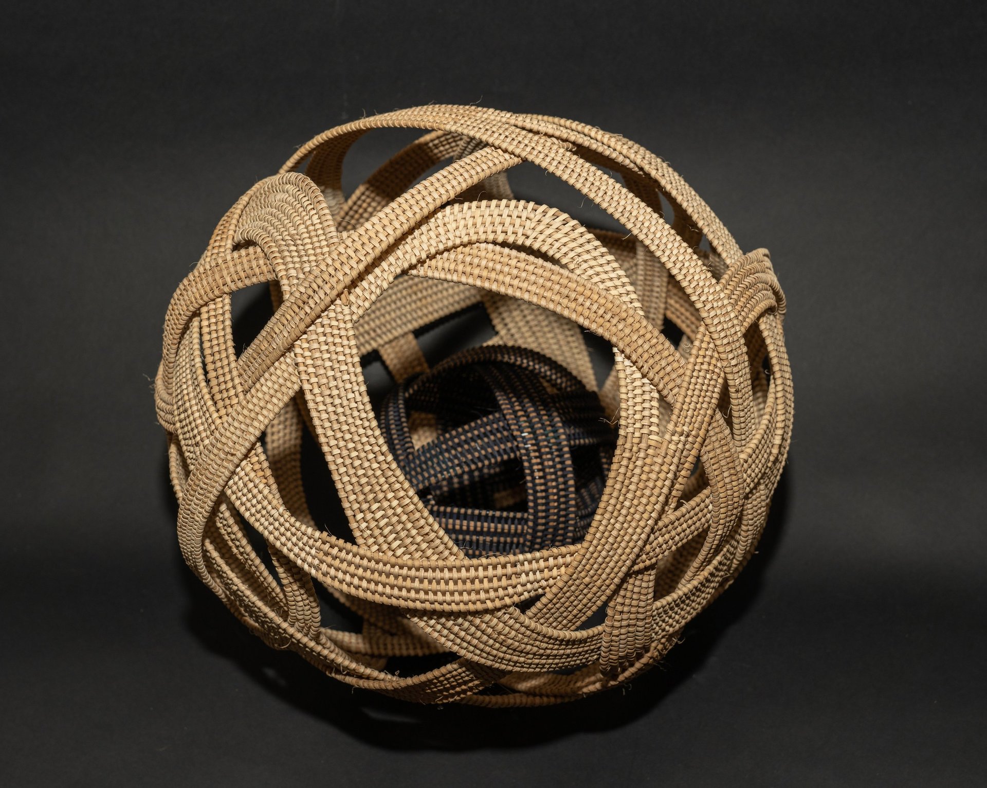 woven sphere black and white contained basket within a basket orb sculpture woven art contemporary complex