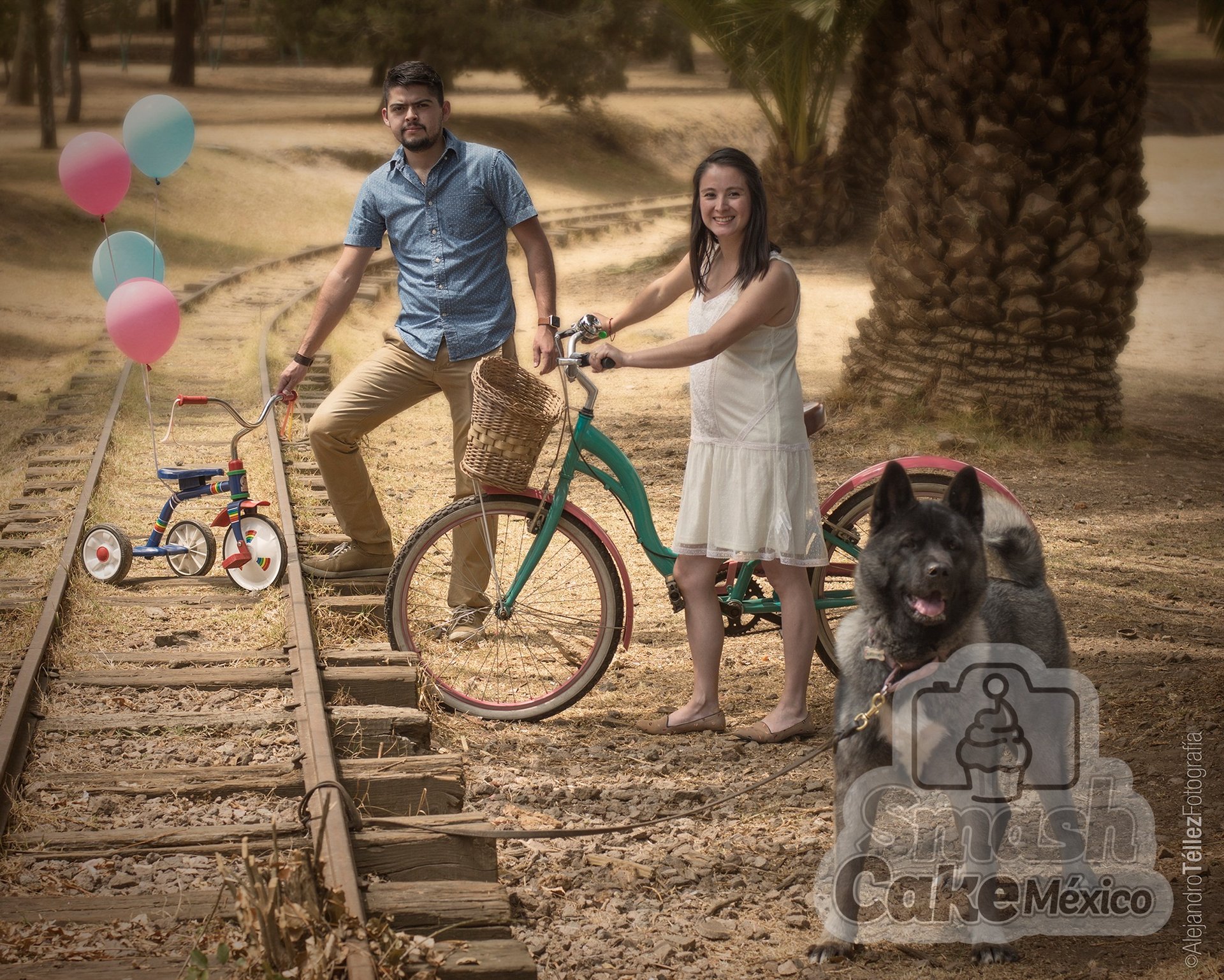 a man and woman standing next to a train track