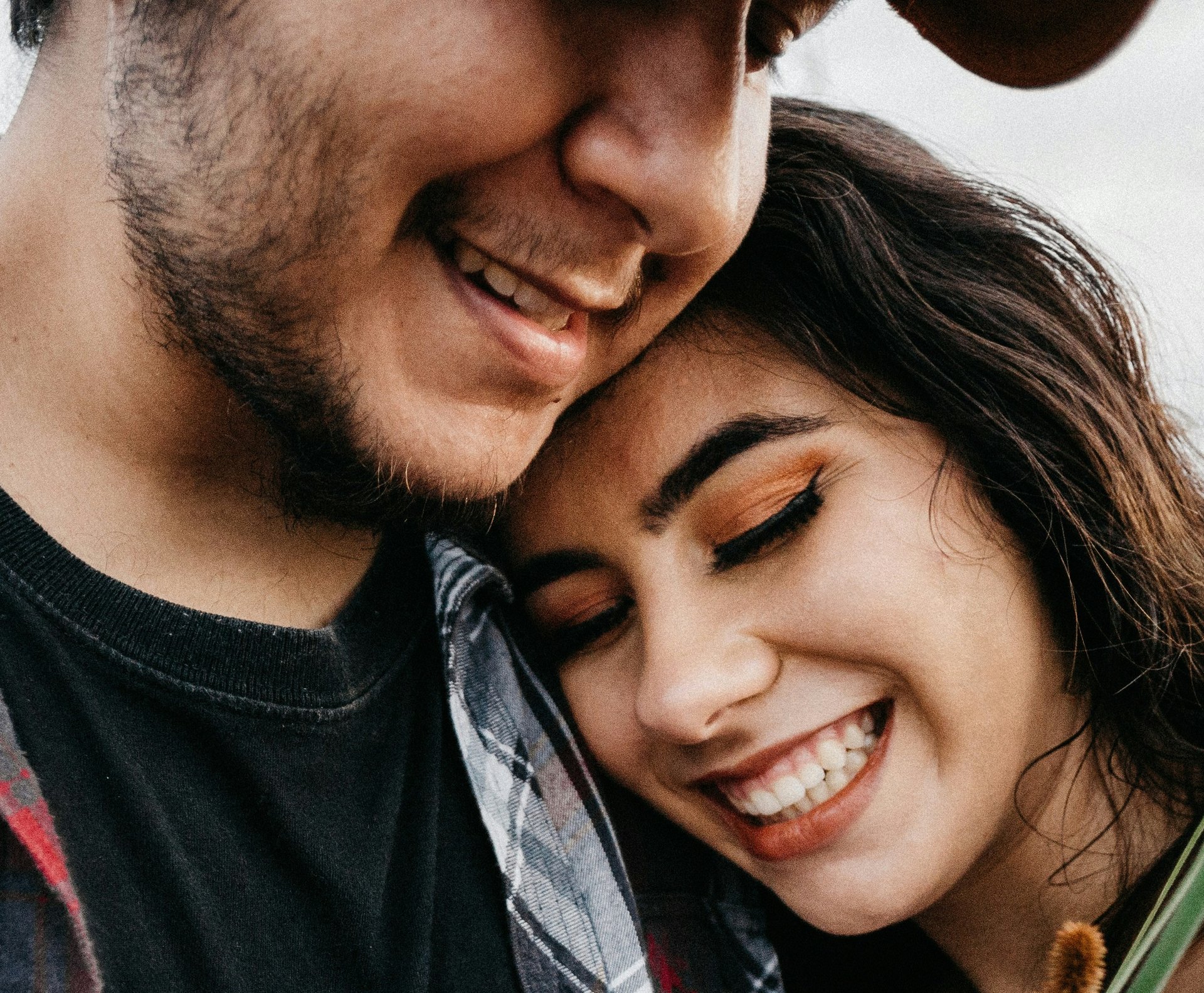 woman and man sharing a genuine moment of deep connection and love