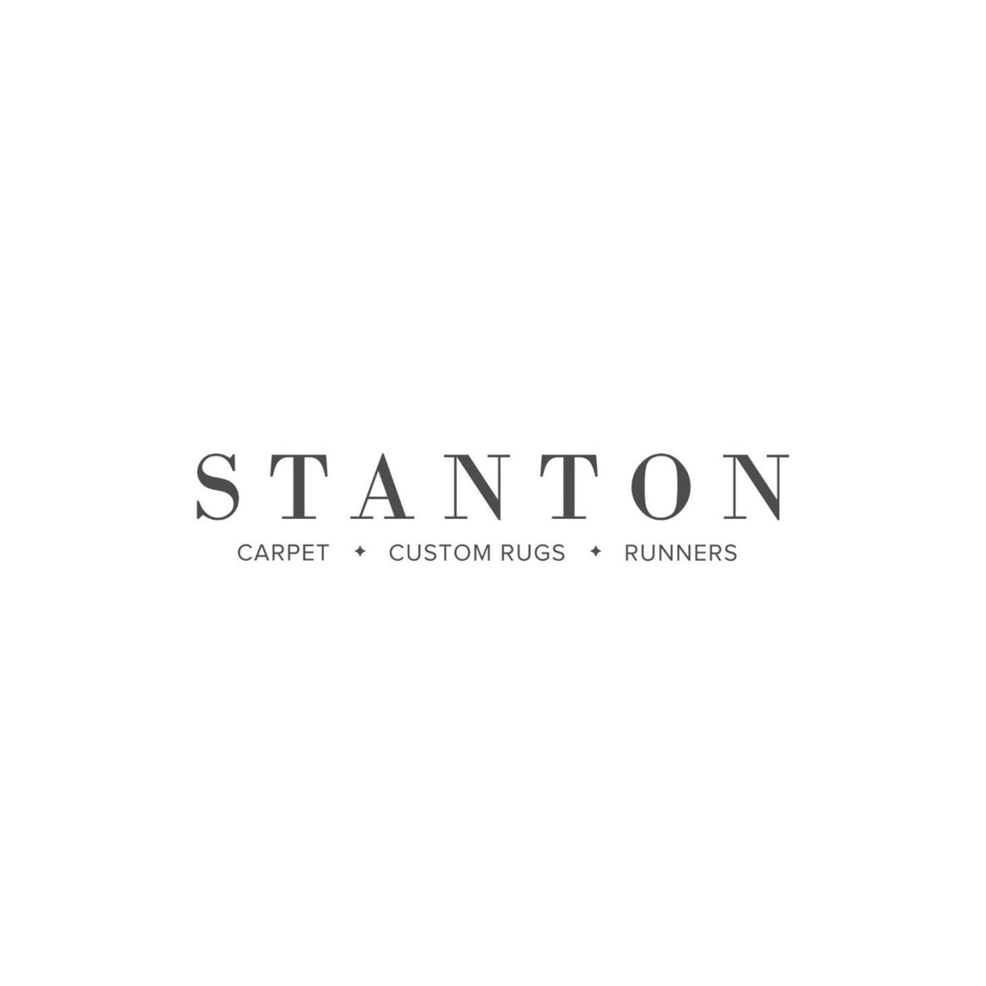 a logo for Stanton Carpet, Custom Rugs, & Runners