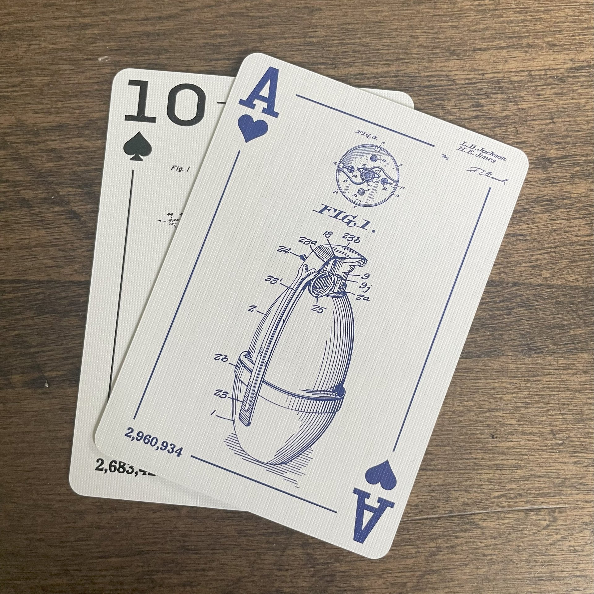 Ace of hearts showing luminating grenade engineering patent drawing