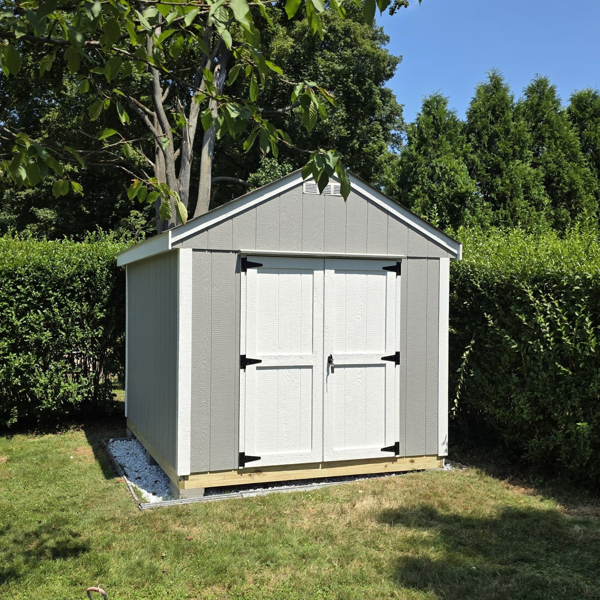 8x10 wooden storage shed with durable construction and classic design for versatile outdoor storage.