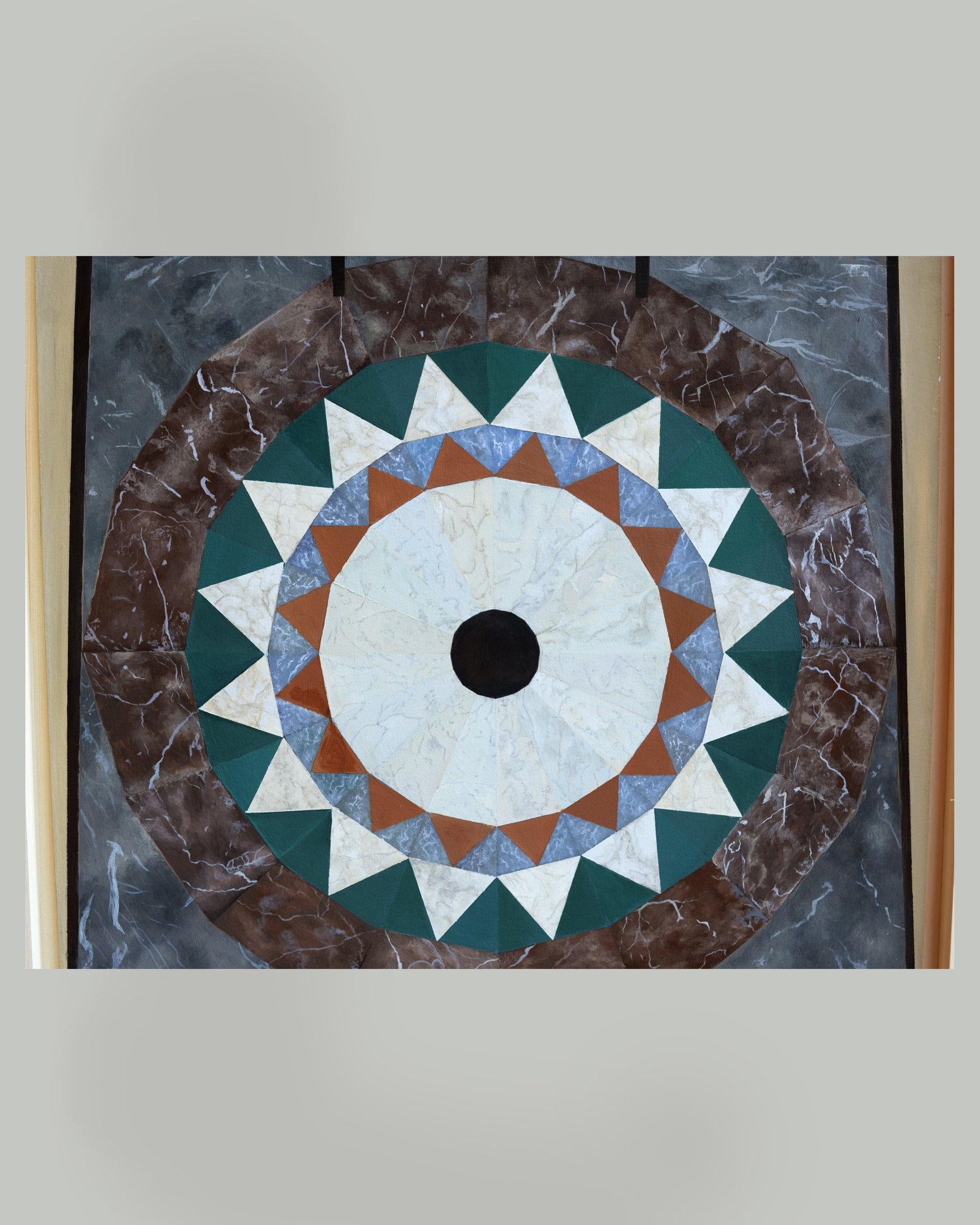 Acrylic painting including details of marble floor mosaic in shape of mandela 