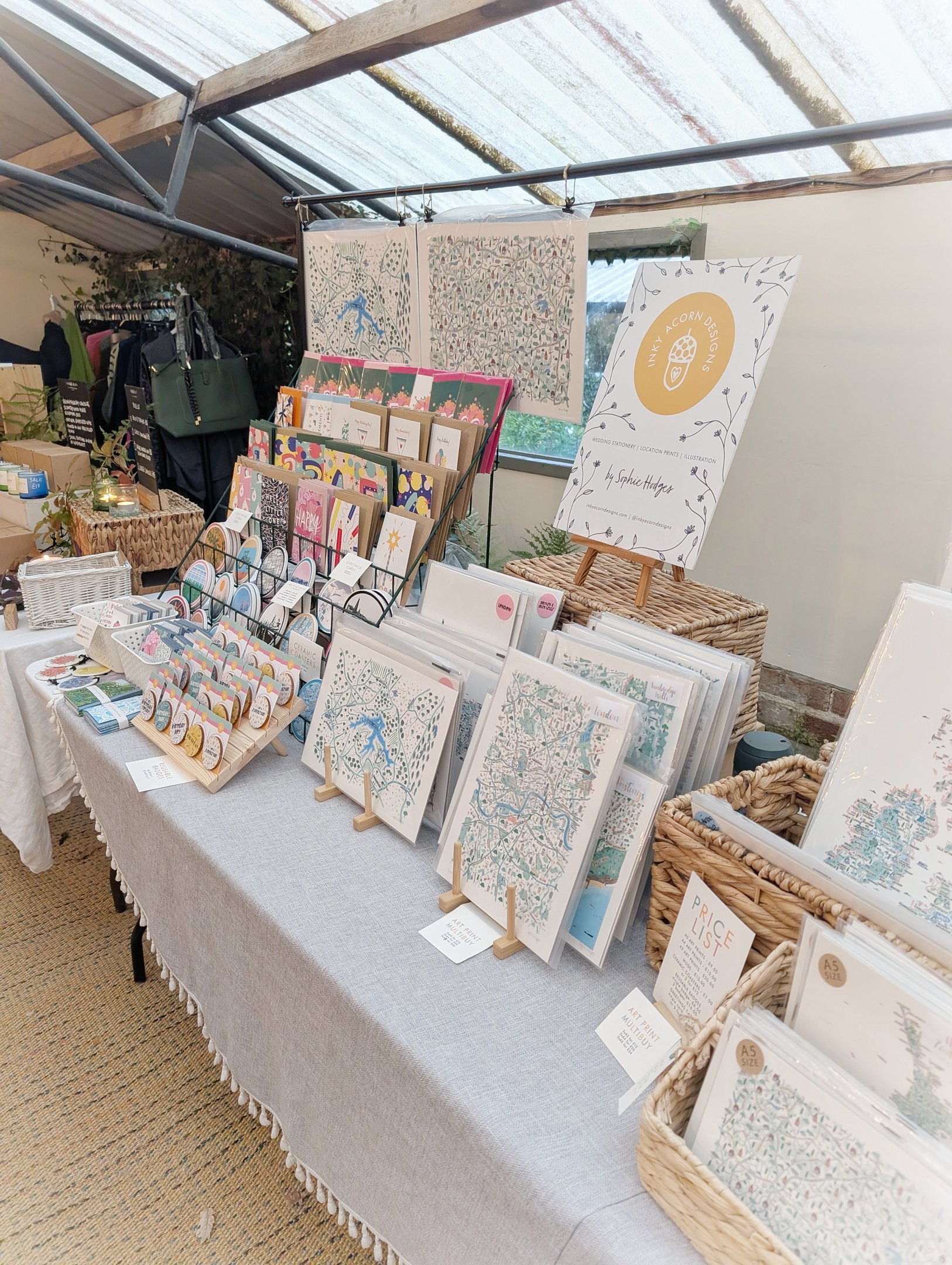 A selection of Inky Acorn Designs illustrated map prints. London map and Bewl Map