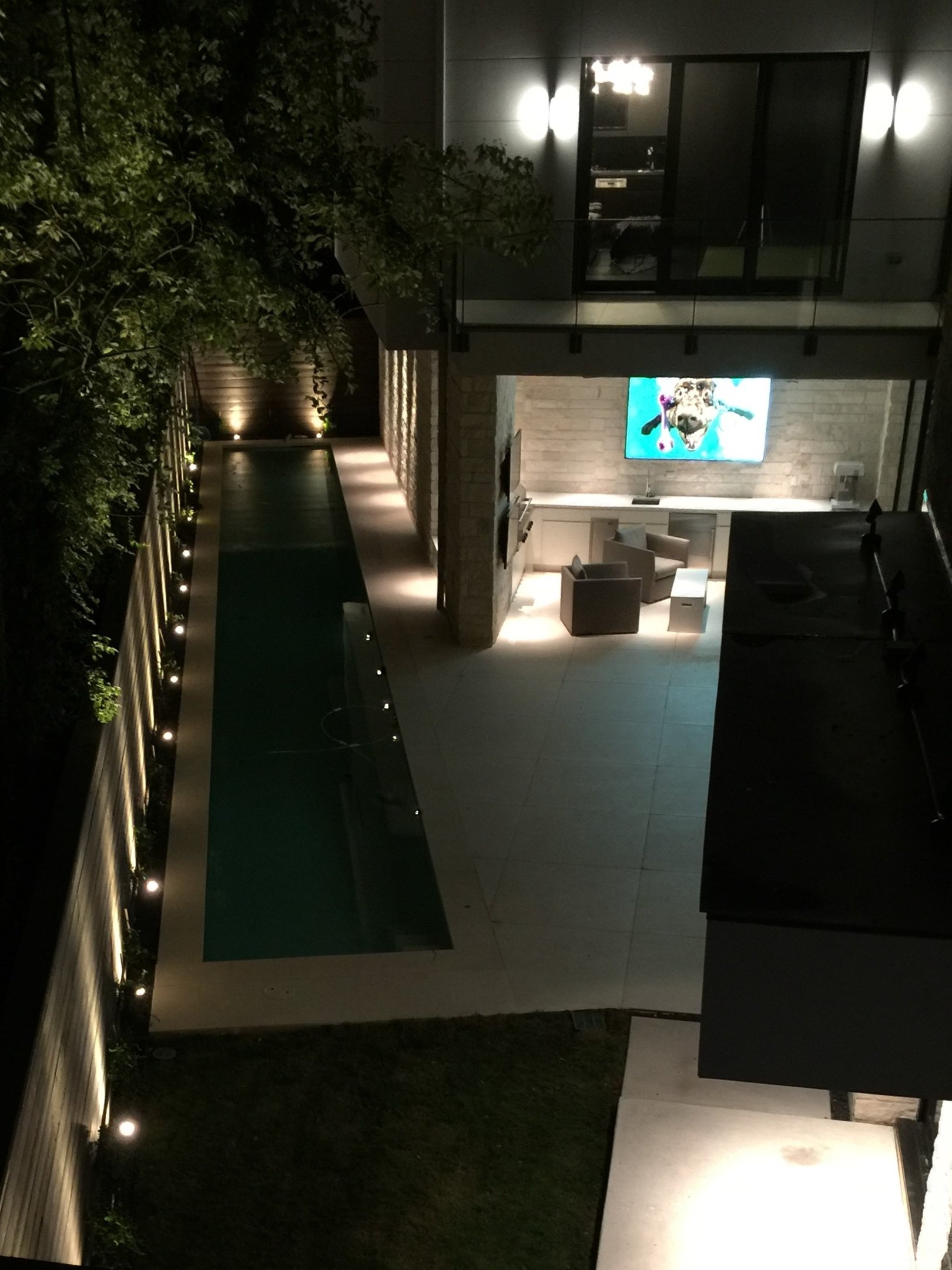 low voltage up lighting along the fenceline