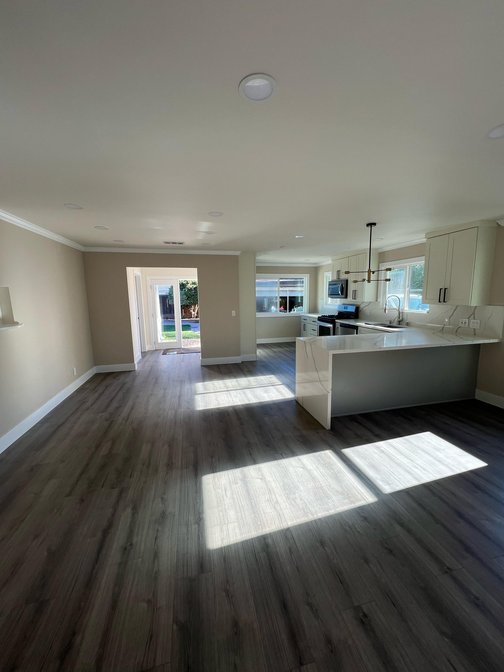 Completed kitchen remodel after construction by Asha Construction
