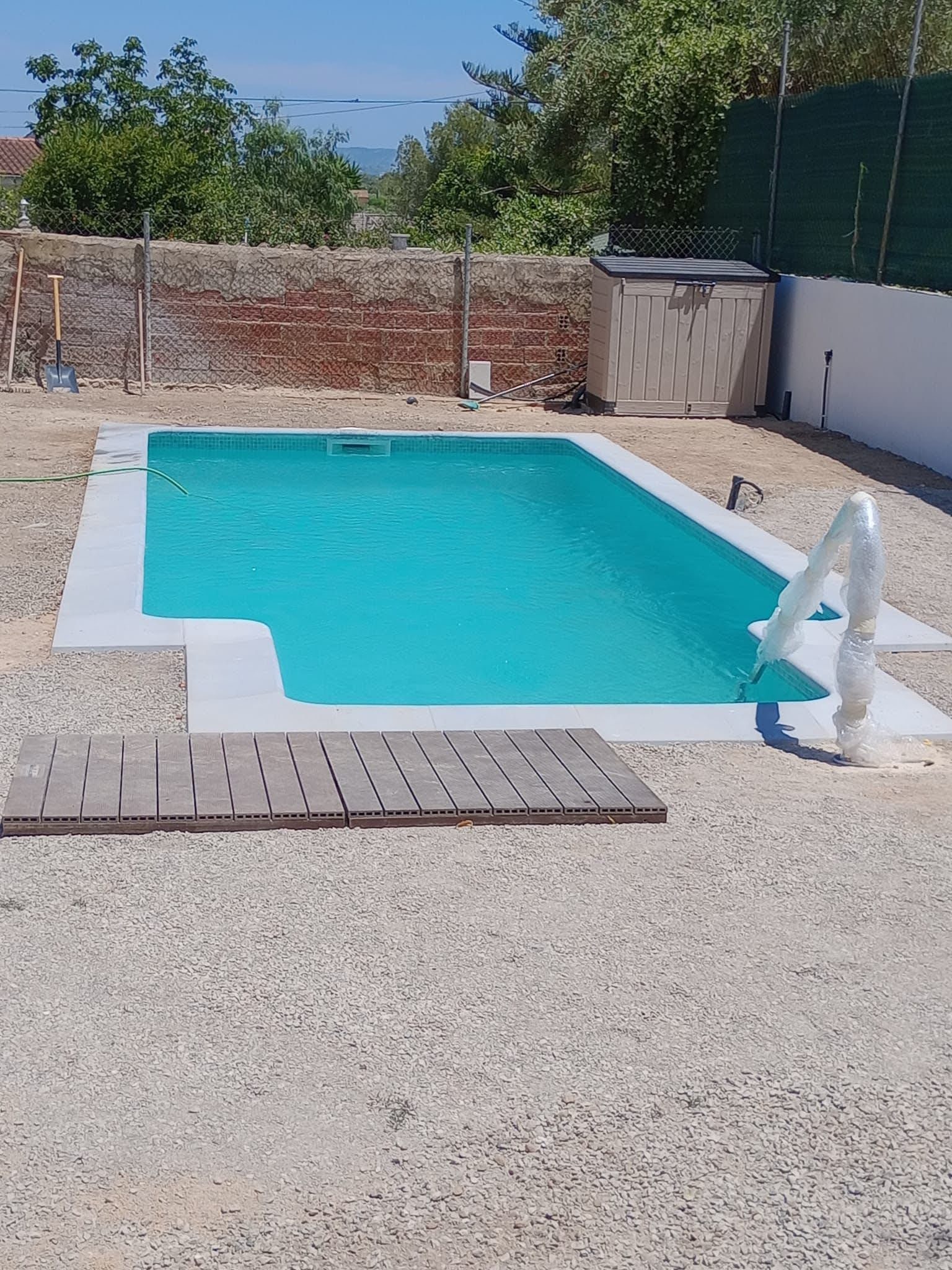 piscina de obra y reforma de terraza