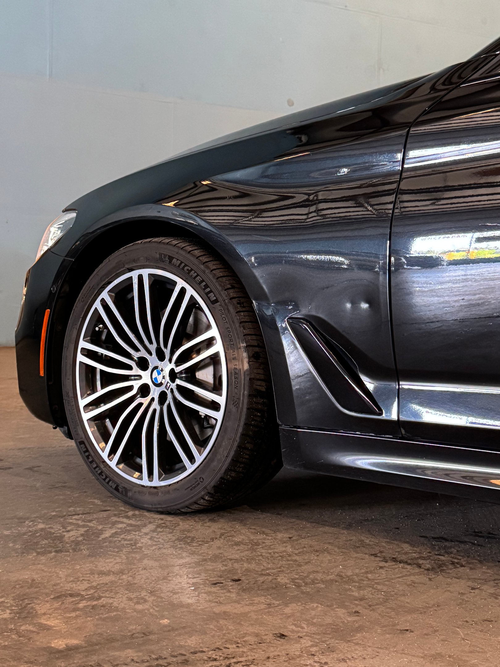 BMW fender damage. Aluminium panel