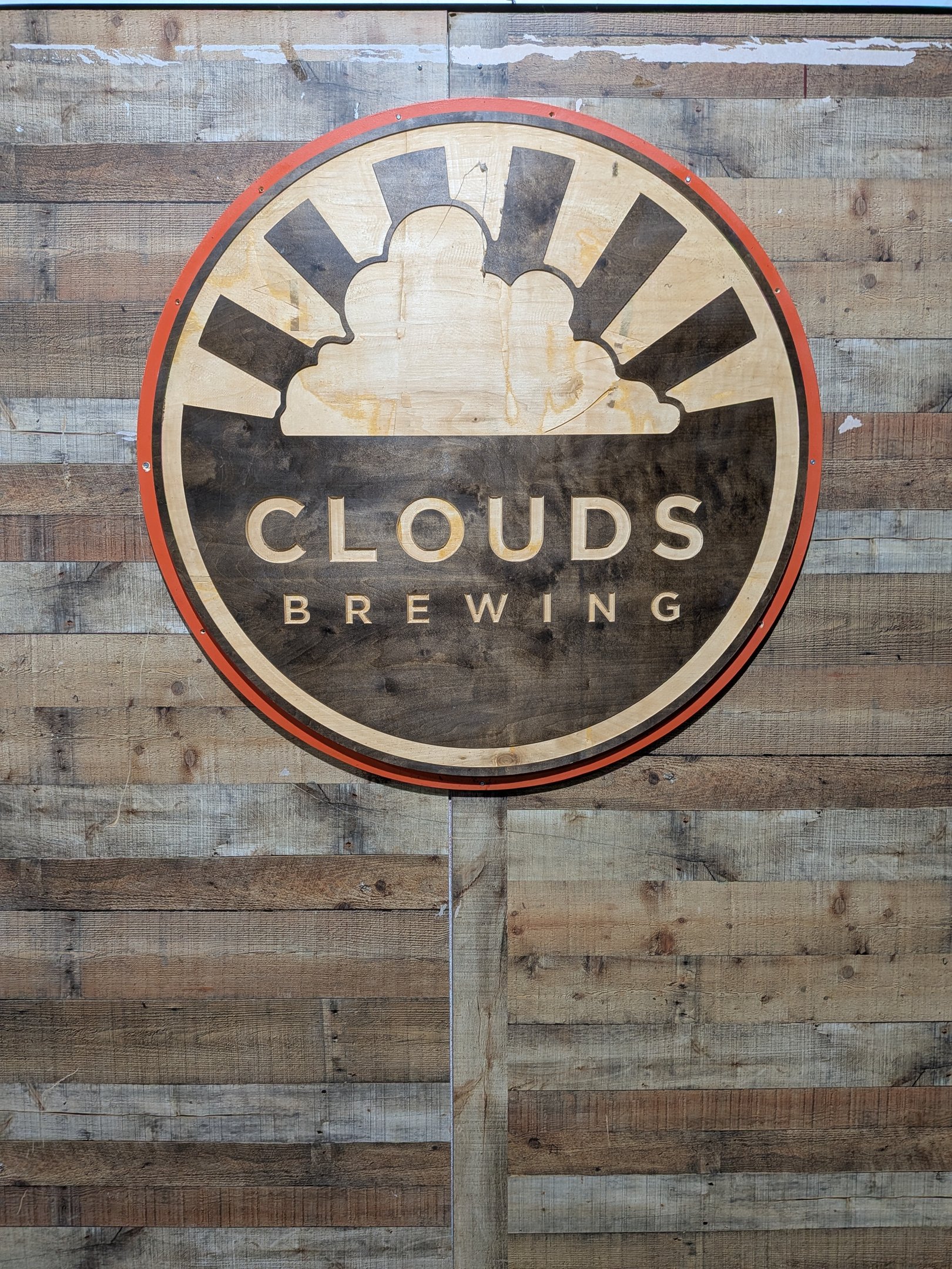 a sign that says clouds brewing