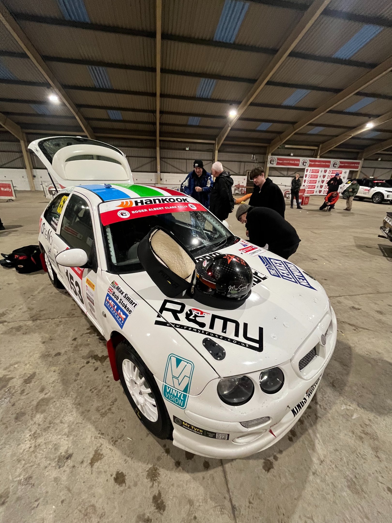 a rally car with a helmet on it