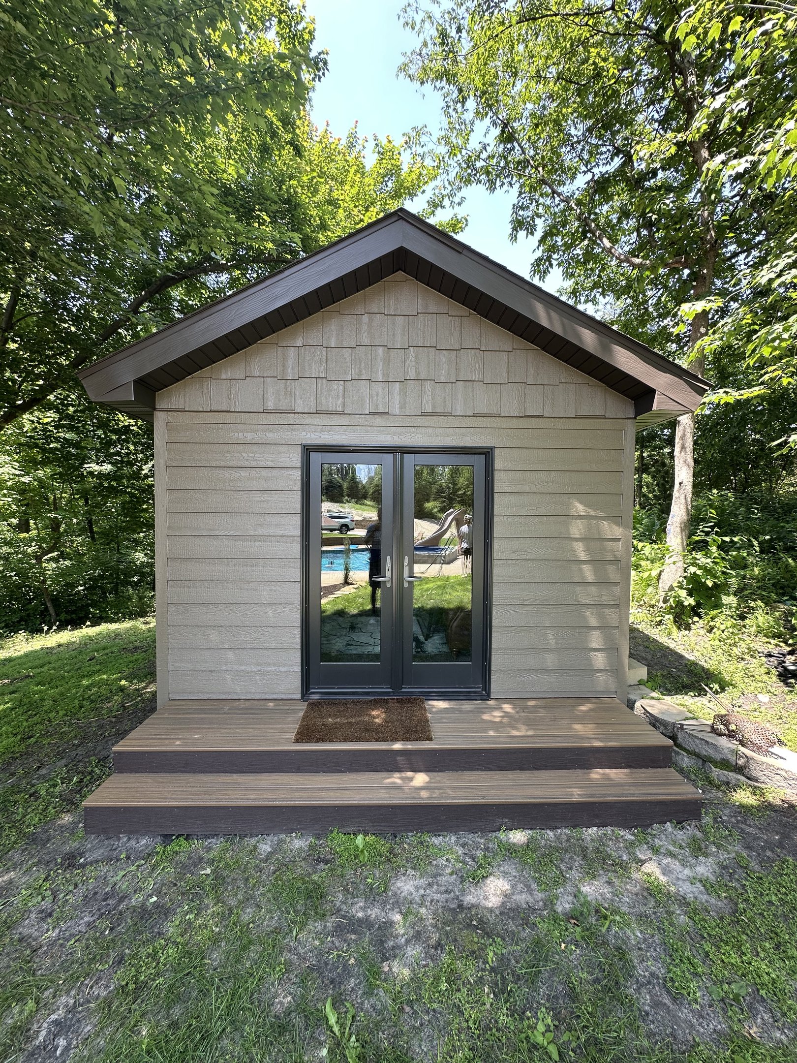 outdoor shed with fresh exterior painting in minnesota