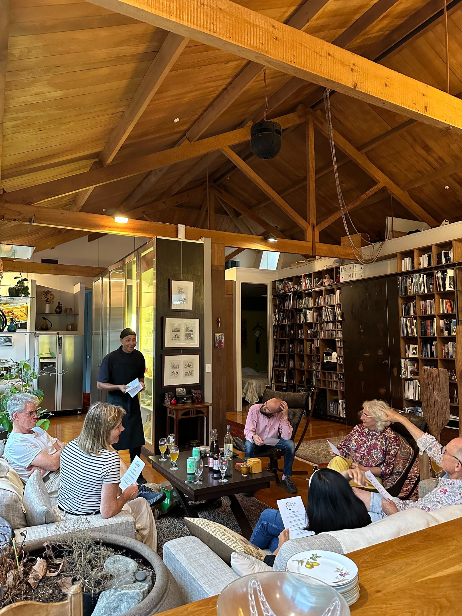 a group of people sitting around a table