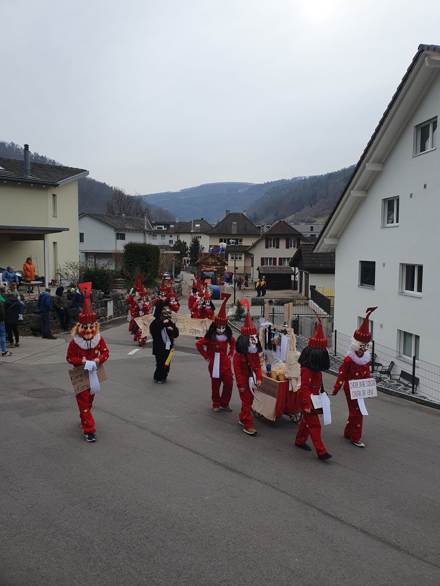 A parade with participants in costume at Oberdorf Switzerland's Fastnacht