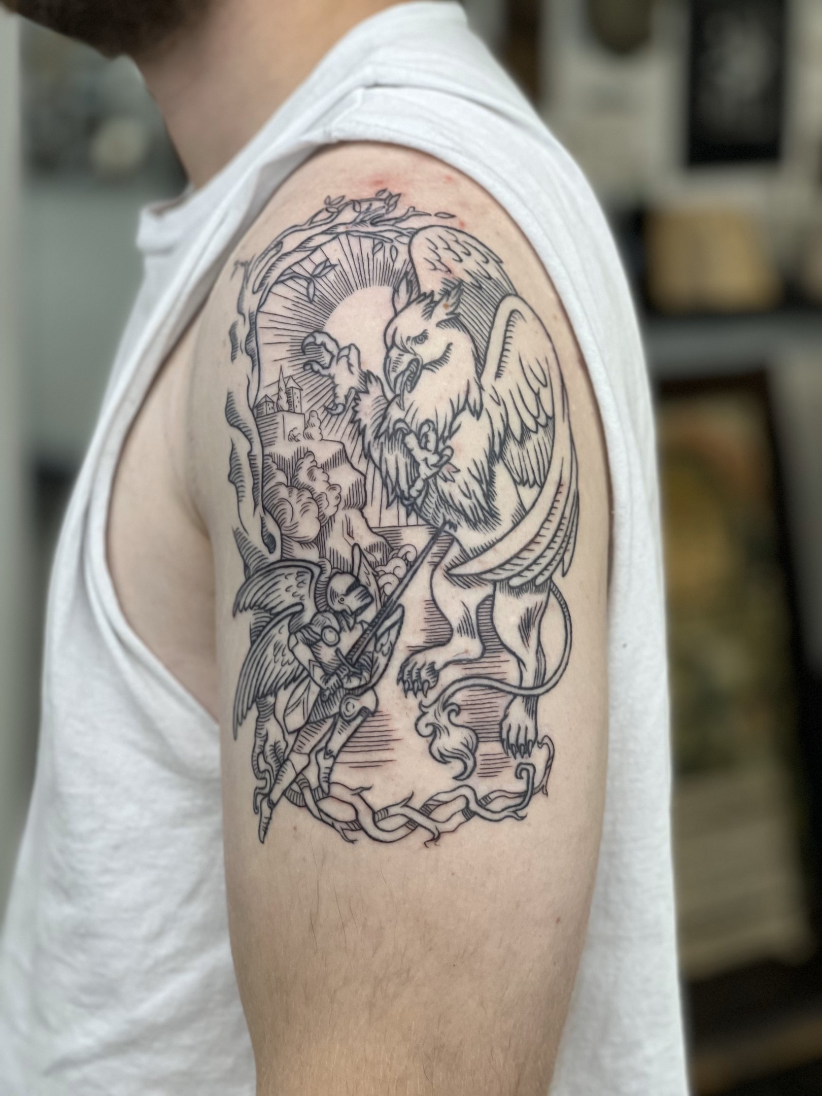 a man with a tattoo on his arm medieval line art epic mythical battle