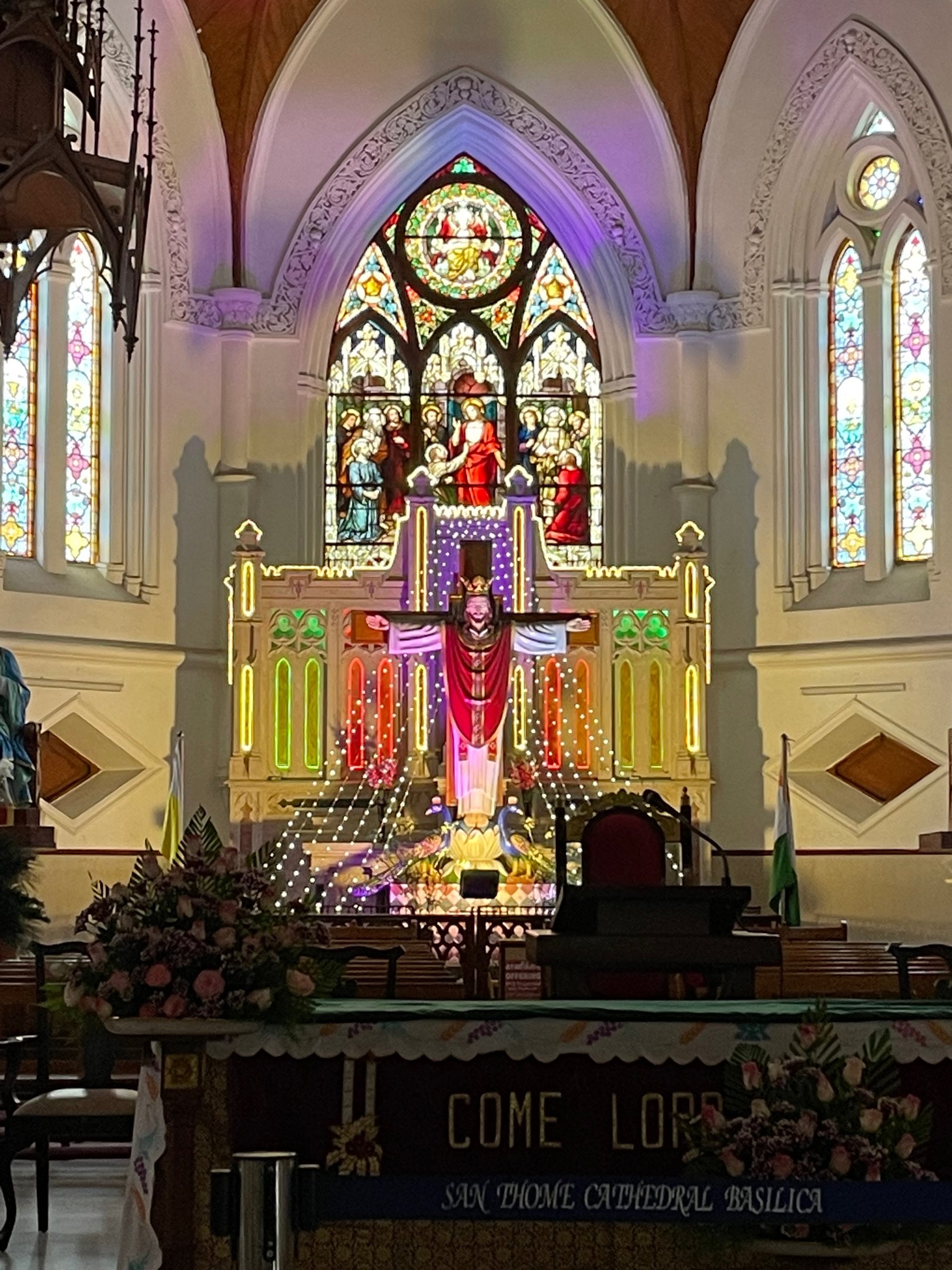 a church with a cross on the altar
