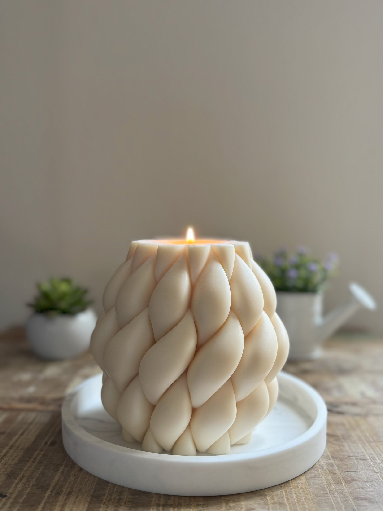 White knitted candle lit
