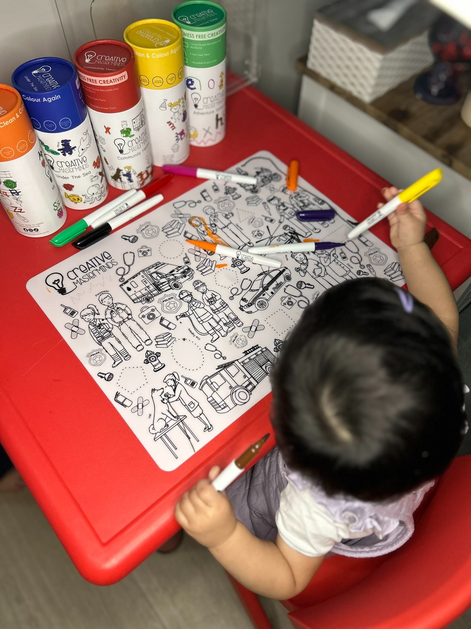 Parent and toddler enjoying mess-free drawing and early learning with Scribbly Kids mats