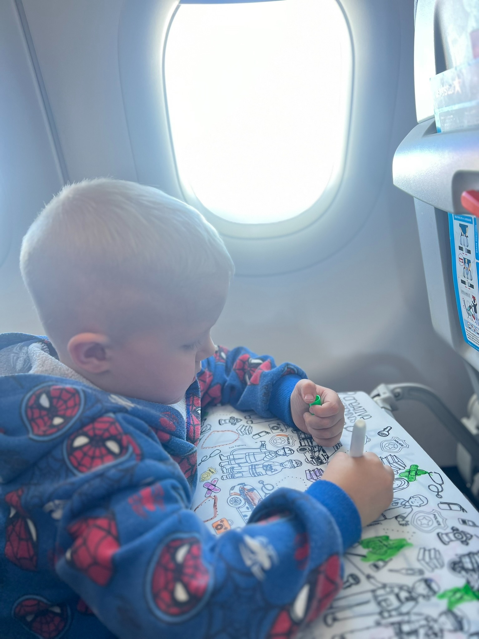 Scribbly Kids reusable drawing mats packed in travel tubes for on-the-go quiet play