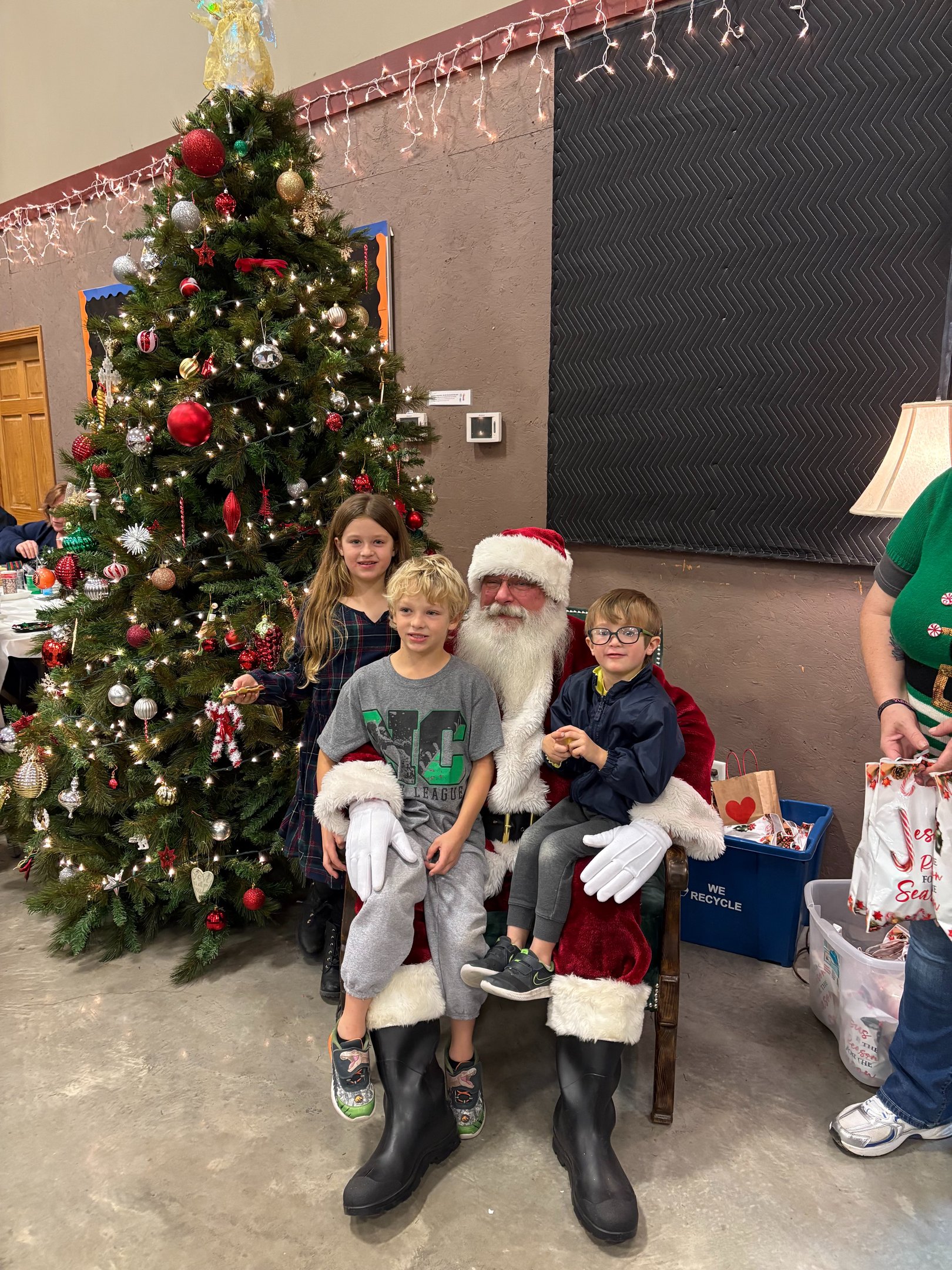Santa Tom with three children