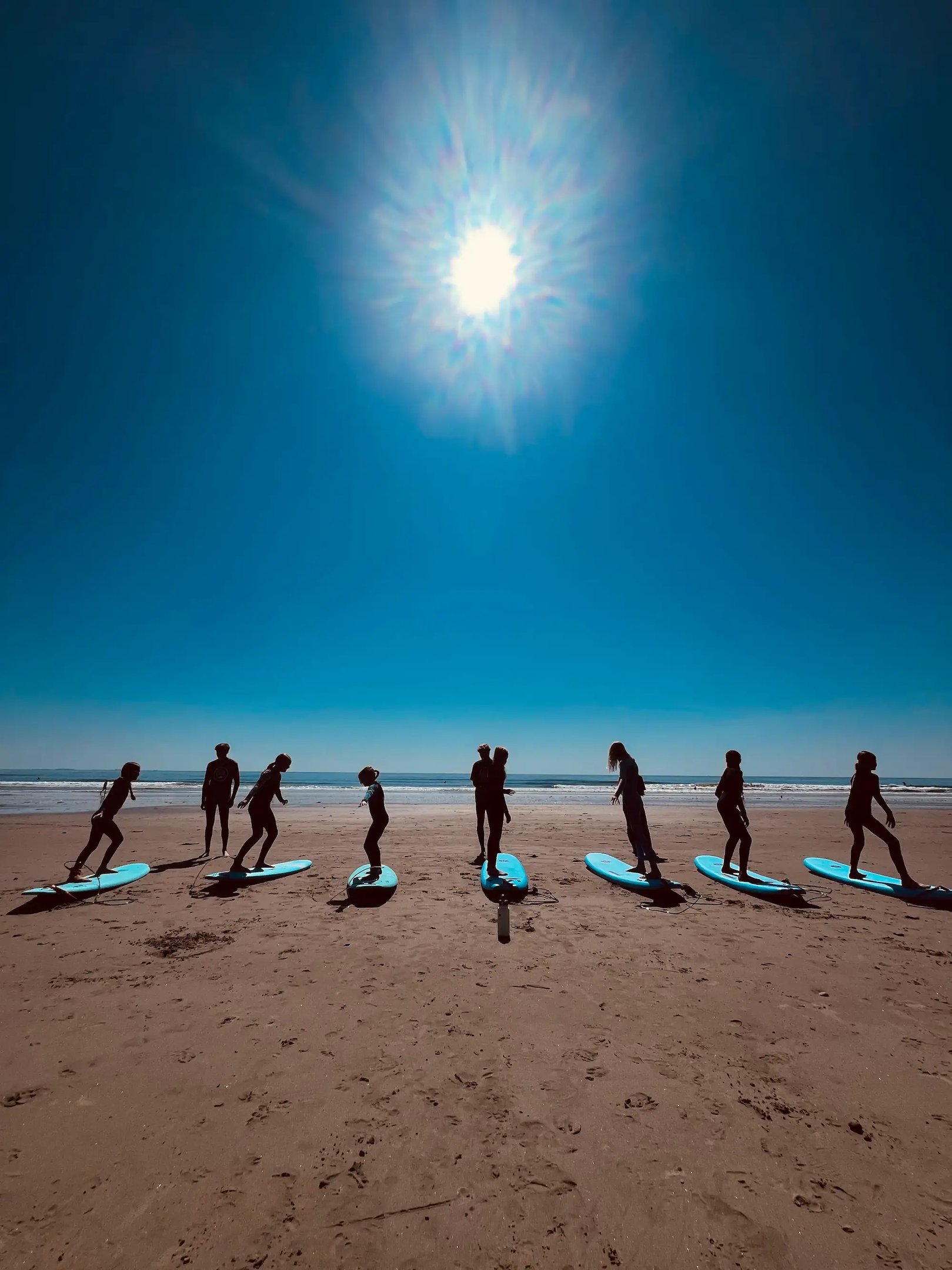 Family surf lesson at The Wall in Hampton, New Hampshire with E Street Surf School