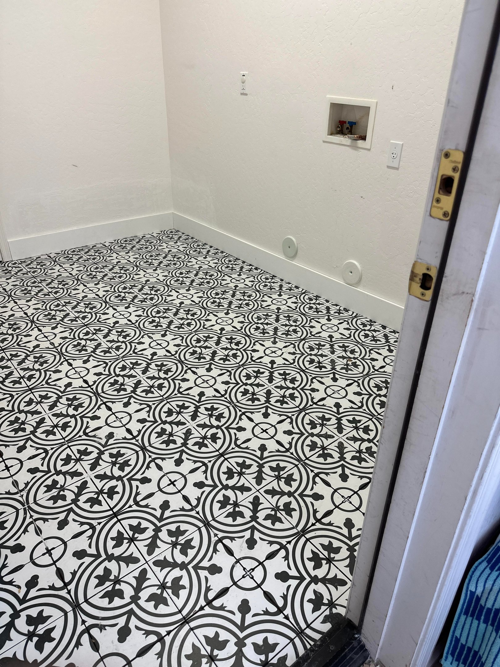 a black and white tile floor
