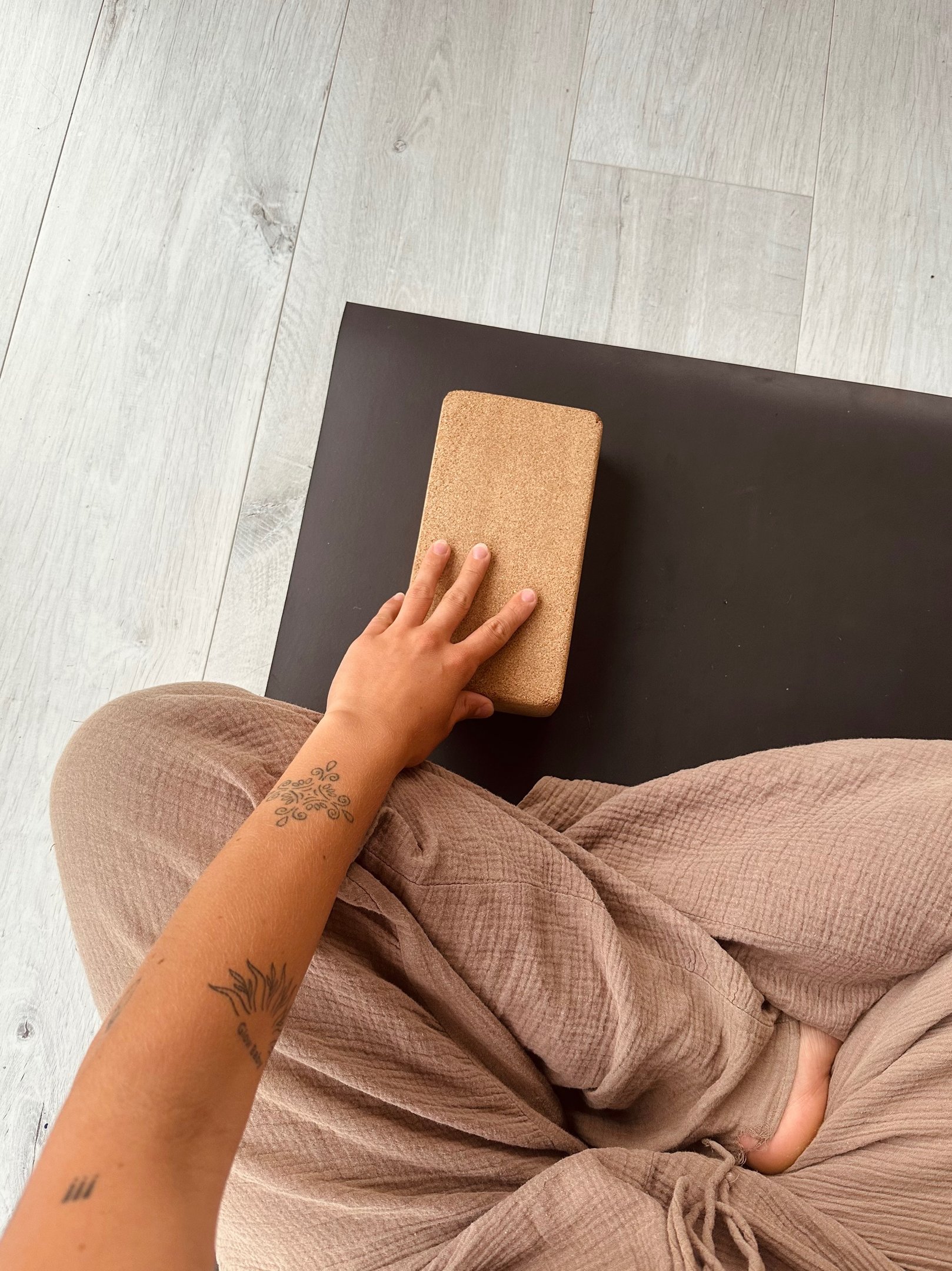 Jean holding a yoga block