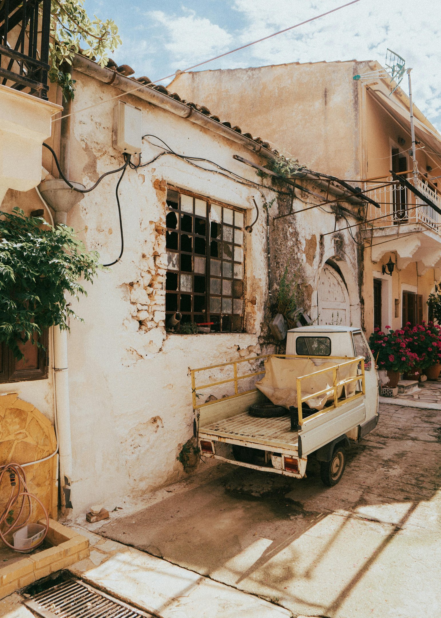 a truck parked in front of a building