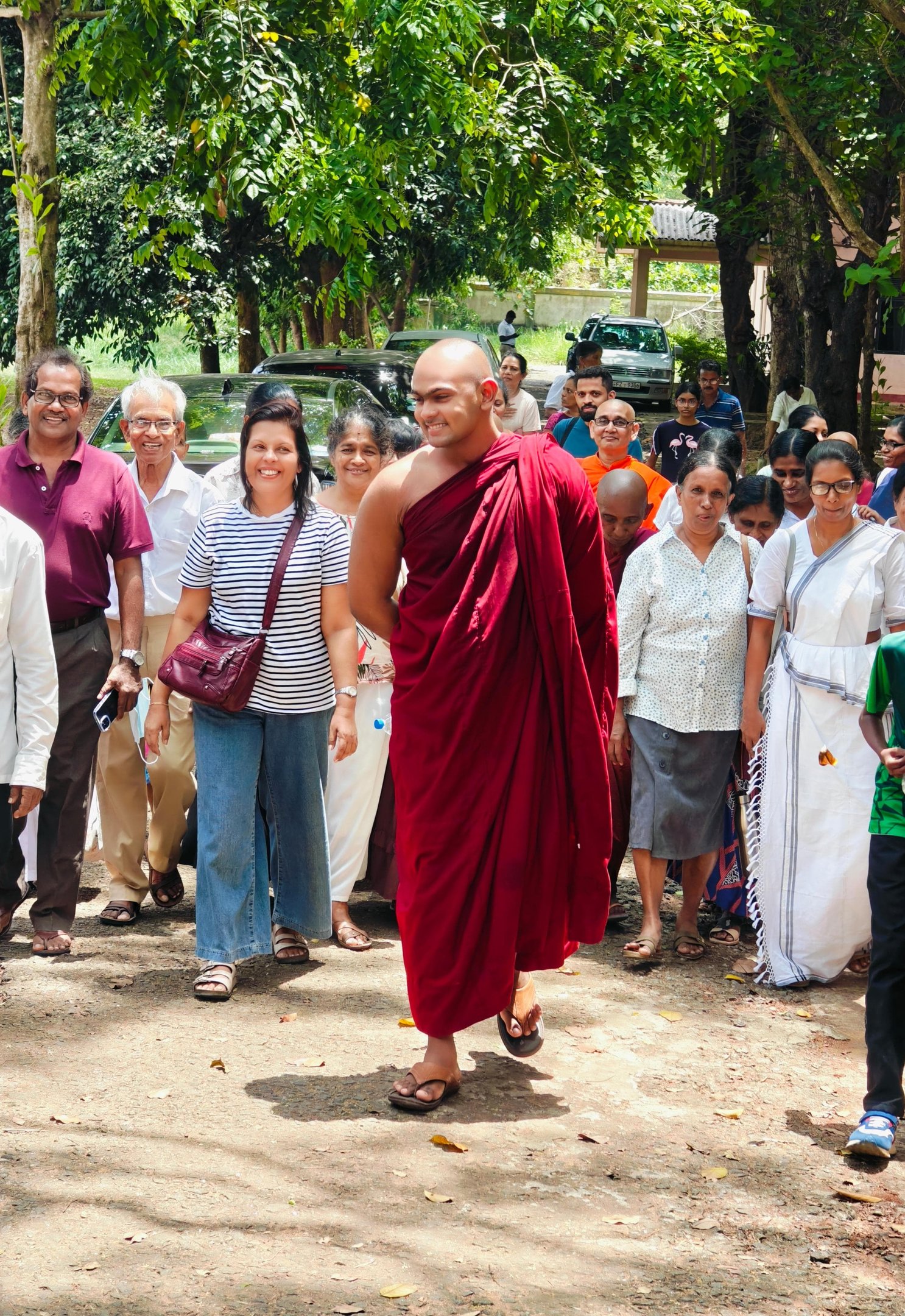 a monk monk in a red robe and a monk in a red robe