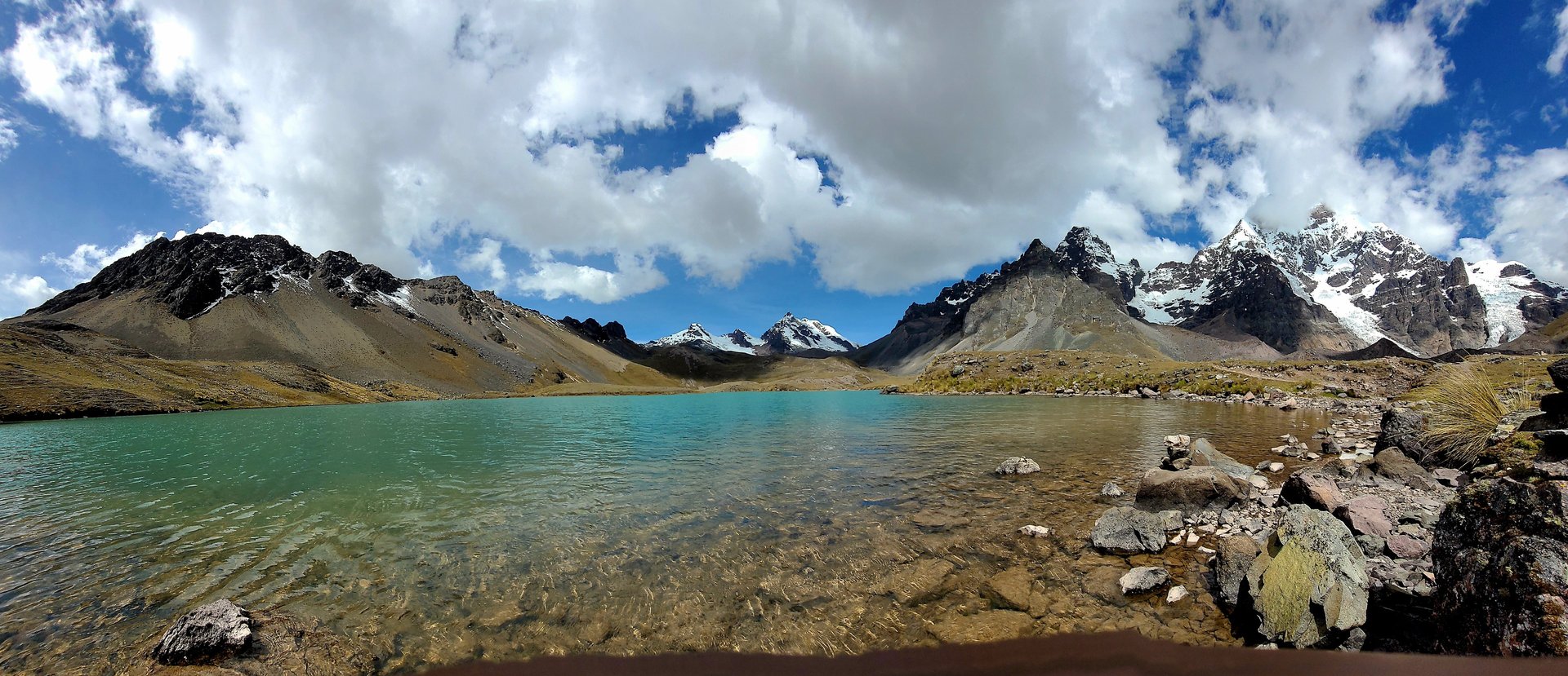 a lake with a mountain in the background