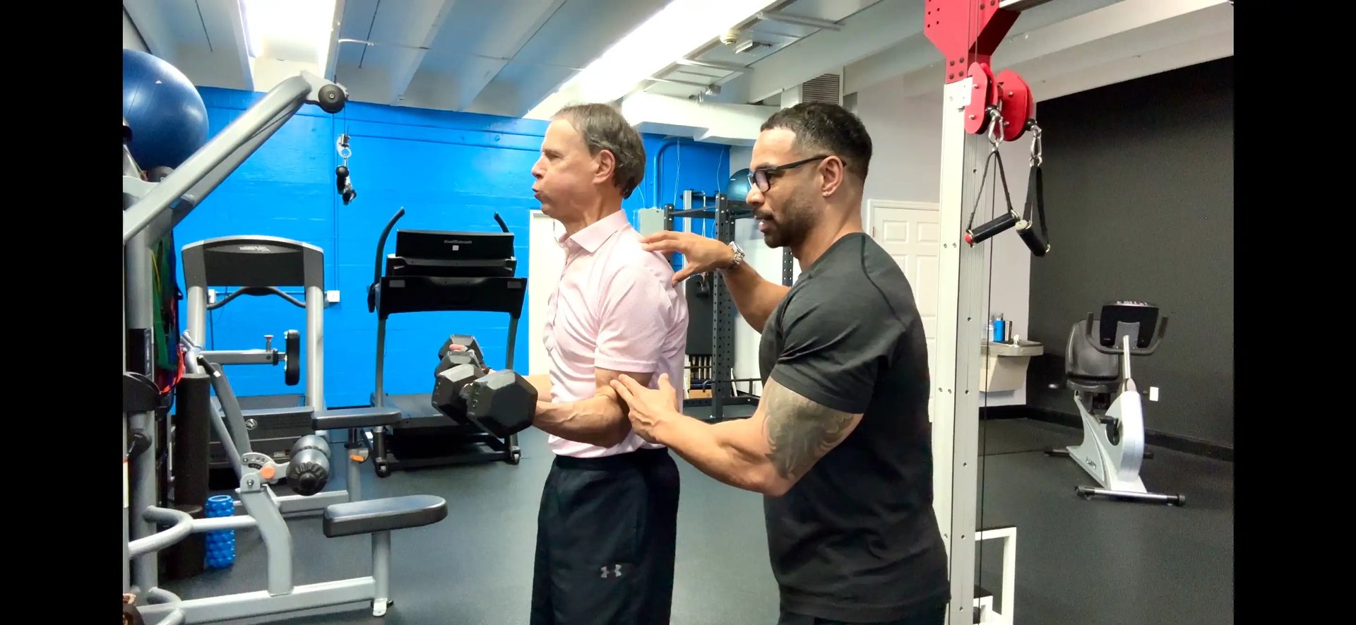 weight training session with senior male