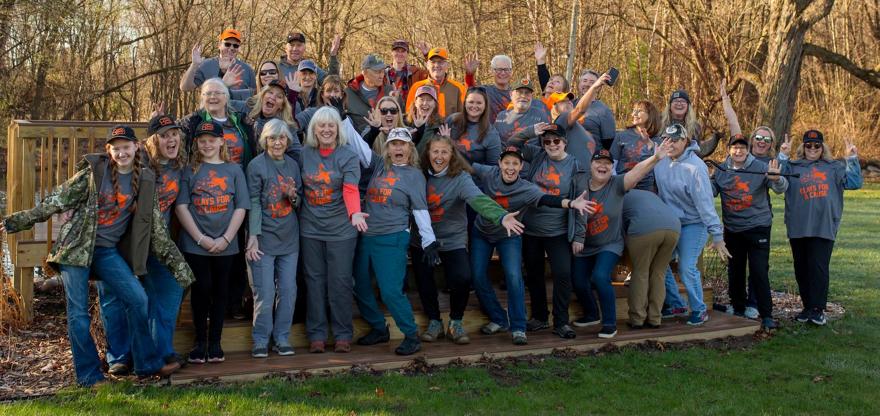 Photo of large group posing after a successful event.