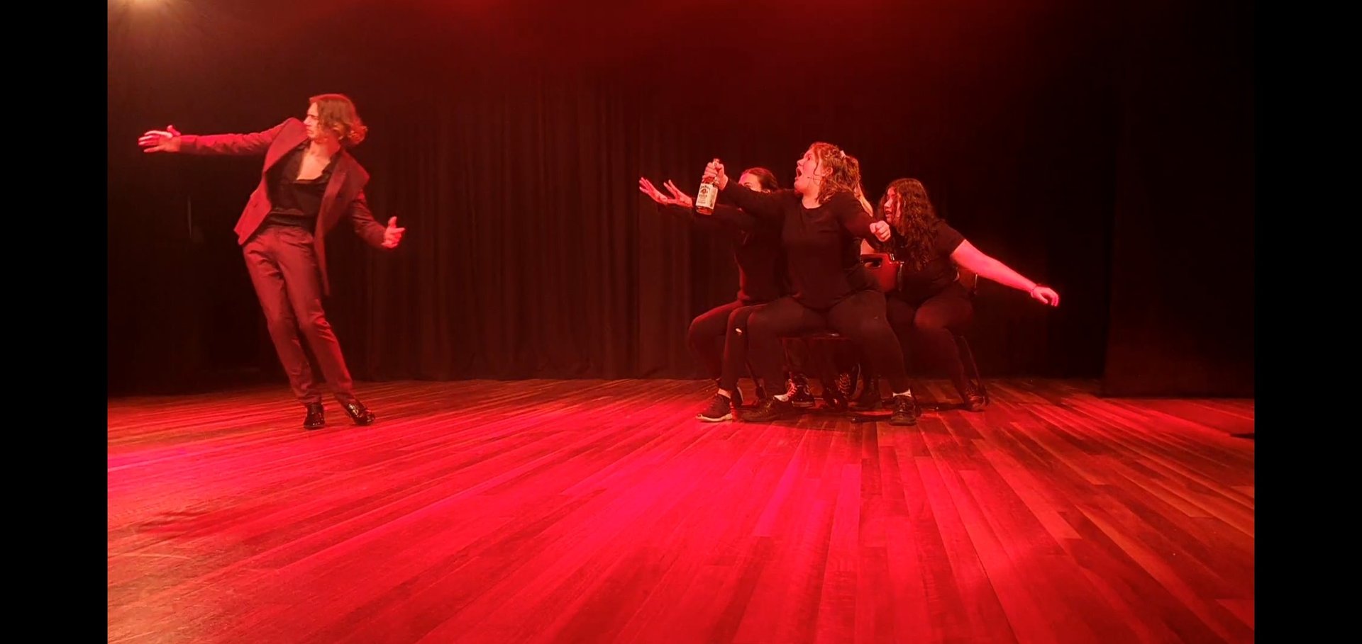 a group of people standing on a stage