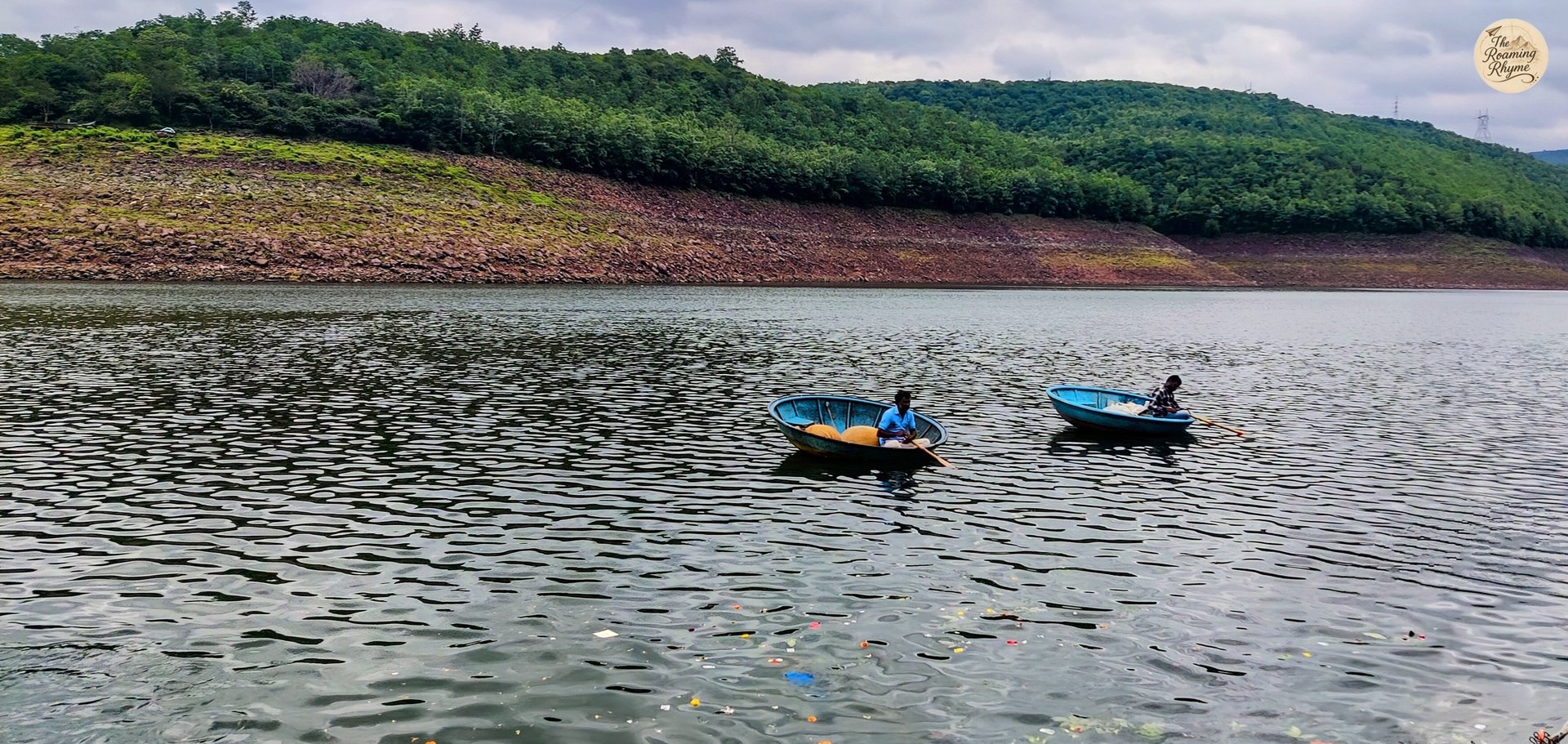 Fishermen in coracles over the Krishna River - captured from Pathalganga.
