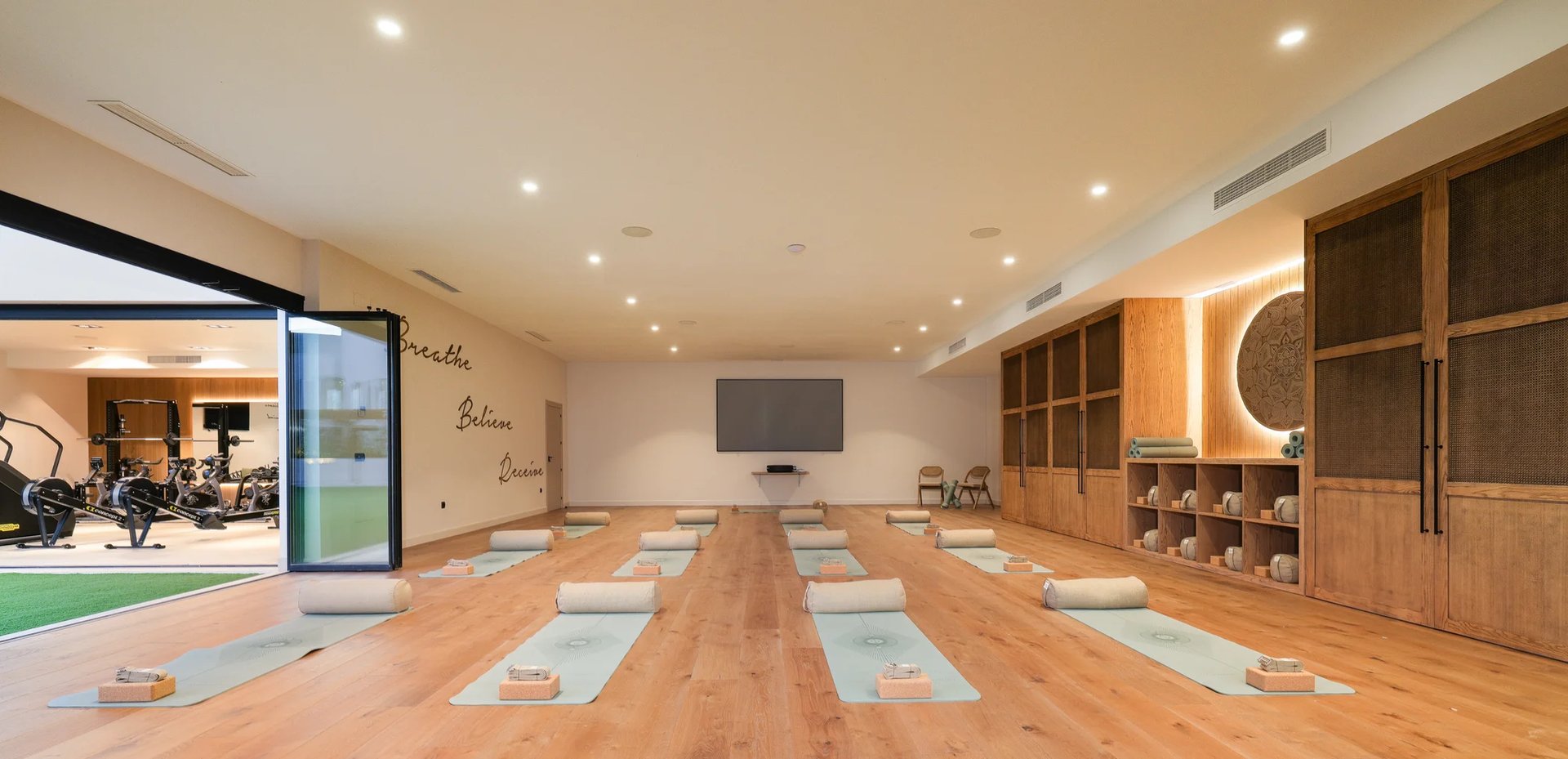 Large yoga studio with mats and built in storage