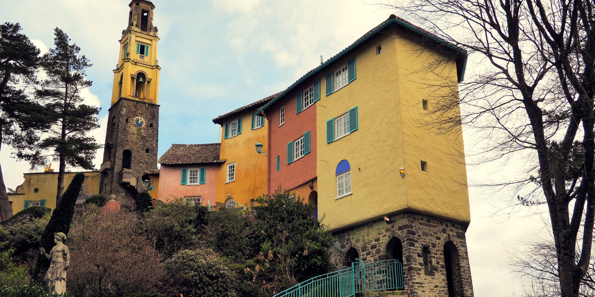 Colorful Italian-style architecture and the iconic clock tower in Portmeirion village, North Wales.