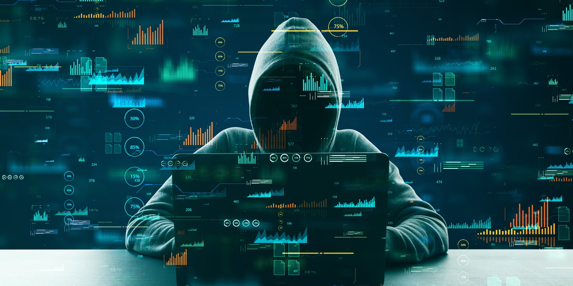 A hooded hacker using a laptop surrounded by digital data analytics, cybersecurity charts, and system code graphs.