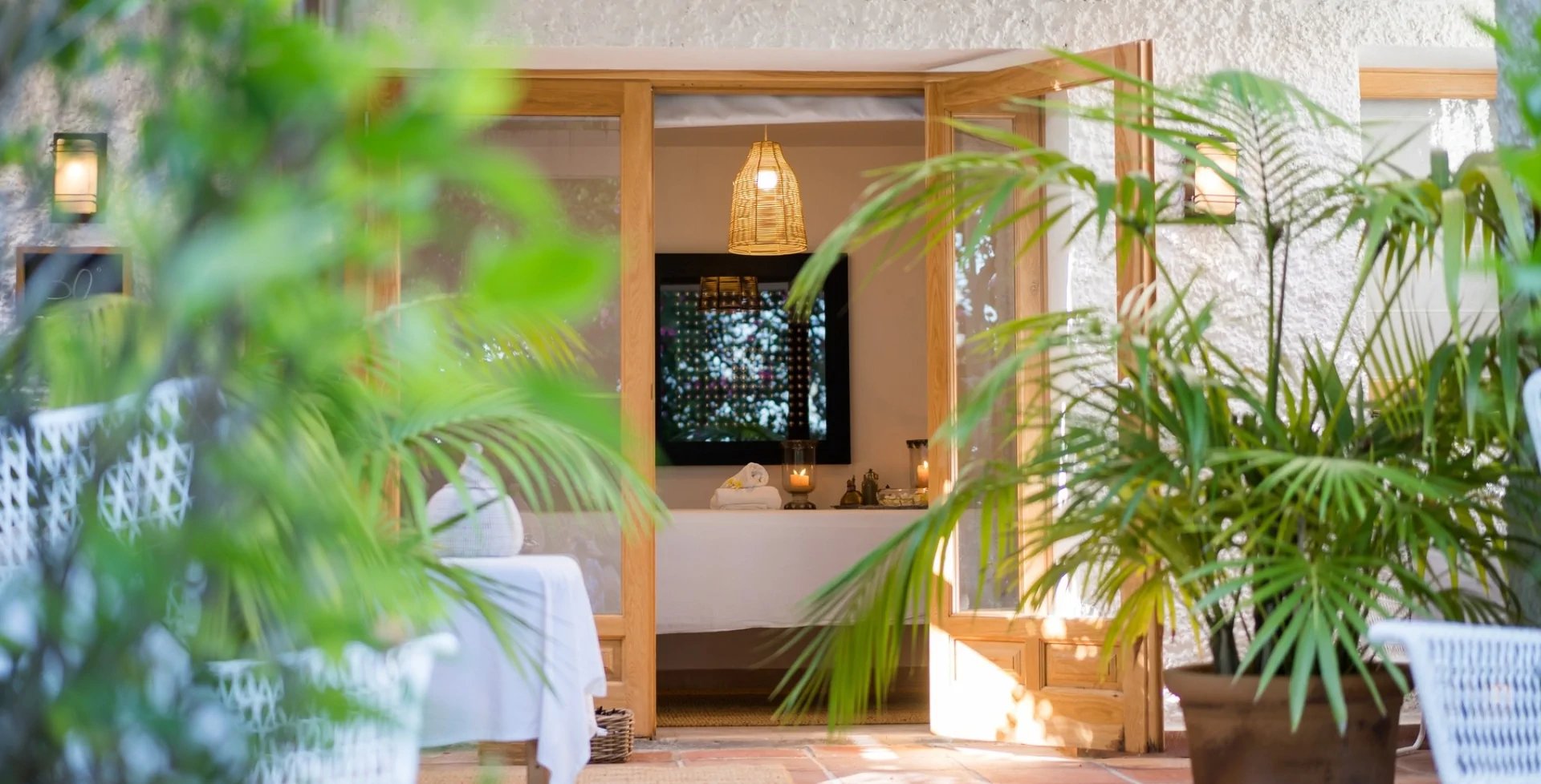 Massage room opening to private terrace