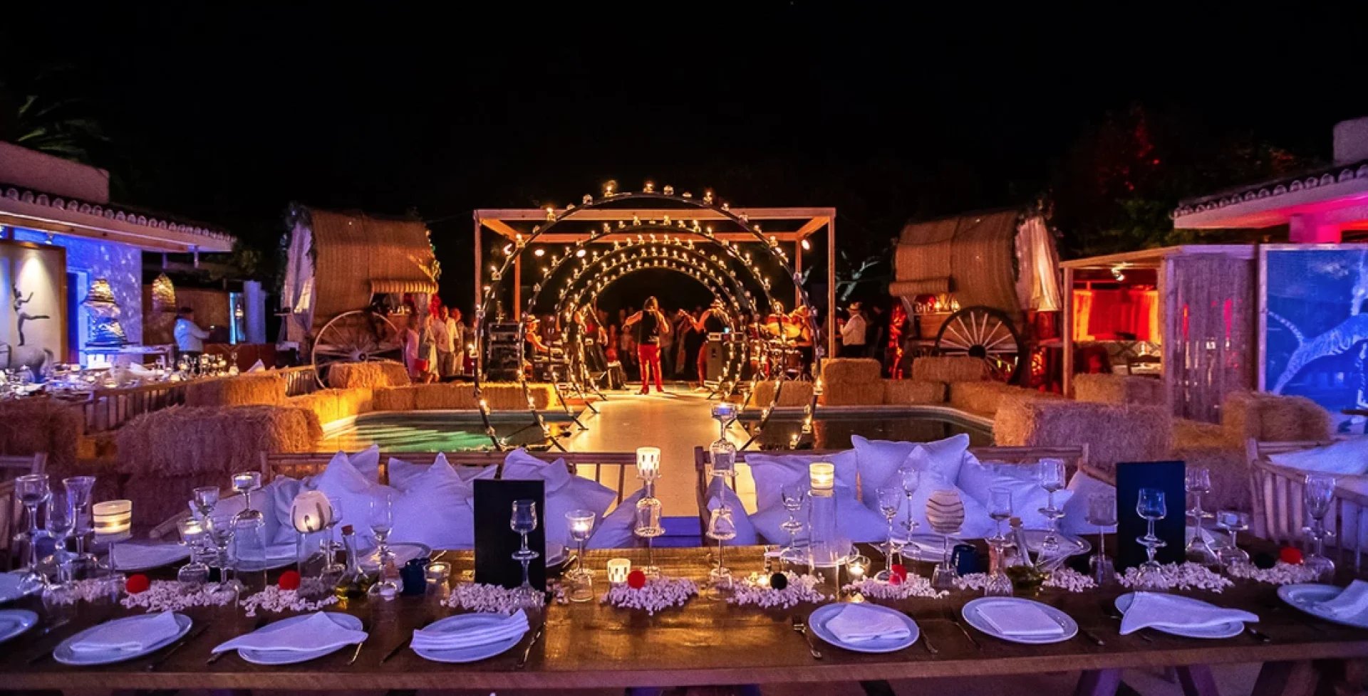 Themed setup with stage and lounge seating