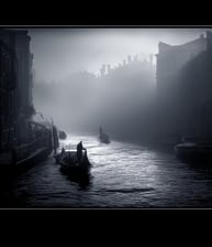 a boat on a river with a person in the background