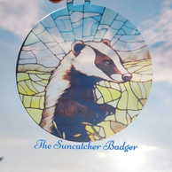 The Suncatcher Badger logo