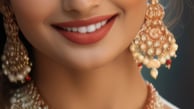 A radiant Indian bride, embellished with intricate jewelry, symbolizing her beauty
