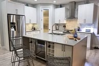 Kelowna custom kitchen with island and built-in wine fridge