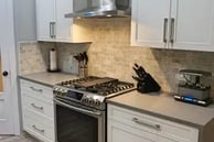 Modern white kitchen cabinets installed in Vernon – KitchenRTA.ca