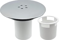a white toilet with a white sink and a white trash canister