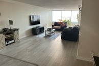Modern residential remodeling displaying flooring upgrades with functional, aesthetic innovation