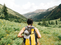 woman hiking by Holly Mandarich