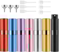 a variety of different colored bottles of different colors
