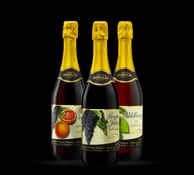 three bottles of non alcoholic donelli sparkling juice